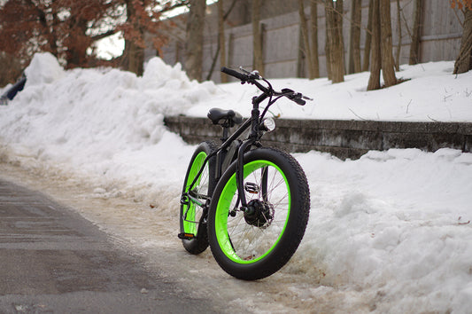 big cat fat cat electric bike, electric bicycle, ebike, fat bike. featuring all terrain tires, 350 watt front hub motor and a lithium ion battery pack 