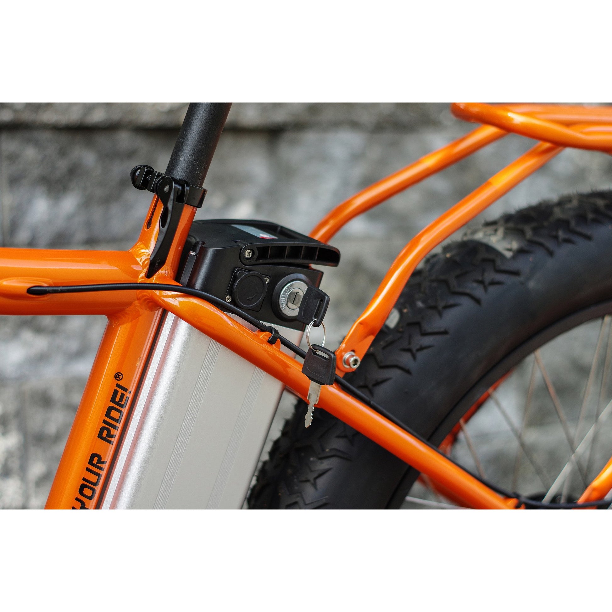 Lithium-ion battery pack in orange electric bike. 